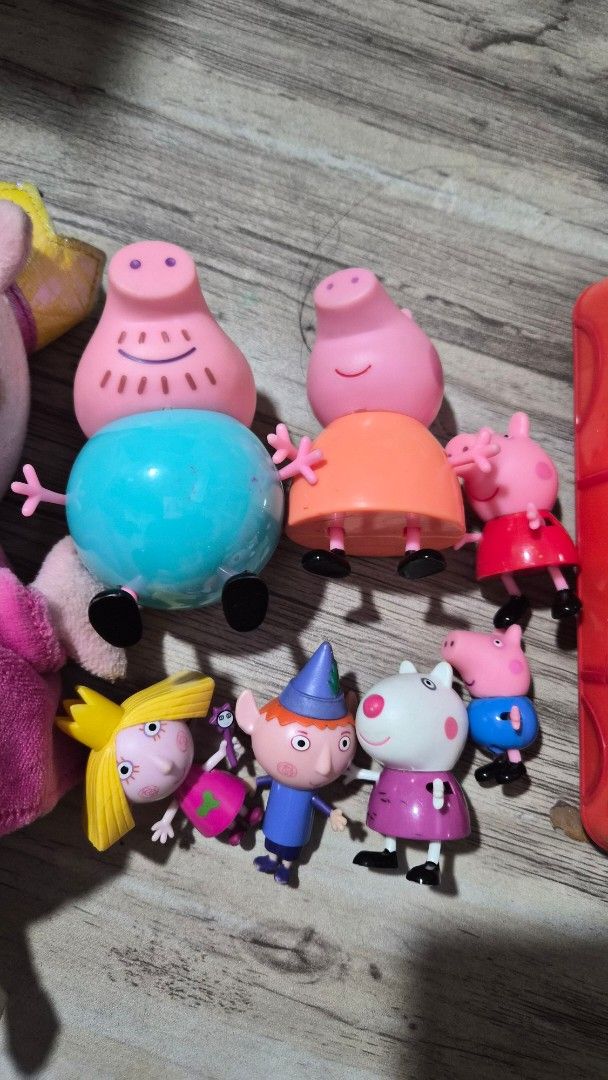 Peppa Pig Plush Toy, Figures, and Accessories Set (Category: Plushies & Soft Toys) located in Manila. Submitted by bellesrelove (Listing ID 1464385927, Image 2). Description: - Bundle of Peppa Pig toys - Includes a Peppa Pig plush with a magic wand - Several small Peppa Pig figures, some with hats and accessories - Comes with a red toy vehicle - Ideal for any Peppa Pig enthusiast - All items are from the official Peppa Pig series.