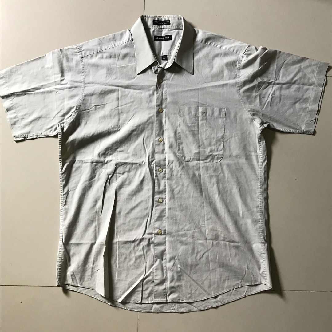Pierre Cardin Short Sleeve Button Down Collar Shirt (Category: Formal Shirts) located in Bauang. Submitted by tavias.shop (Listing ID 1464440051, Image 1). Description: from US box excellent condition no flaws, lints or signs of wear stone gray or greige color steal price🍀.