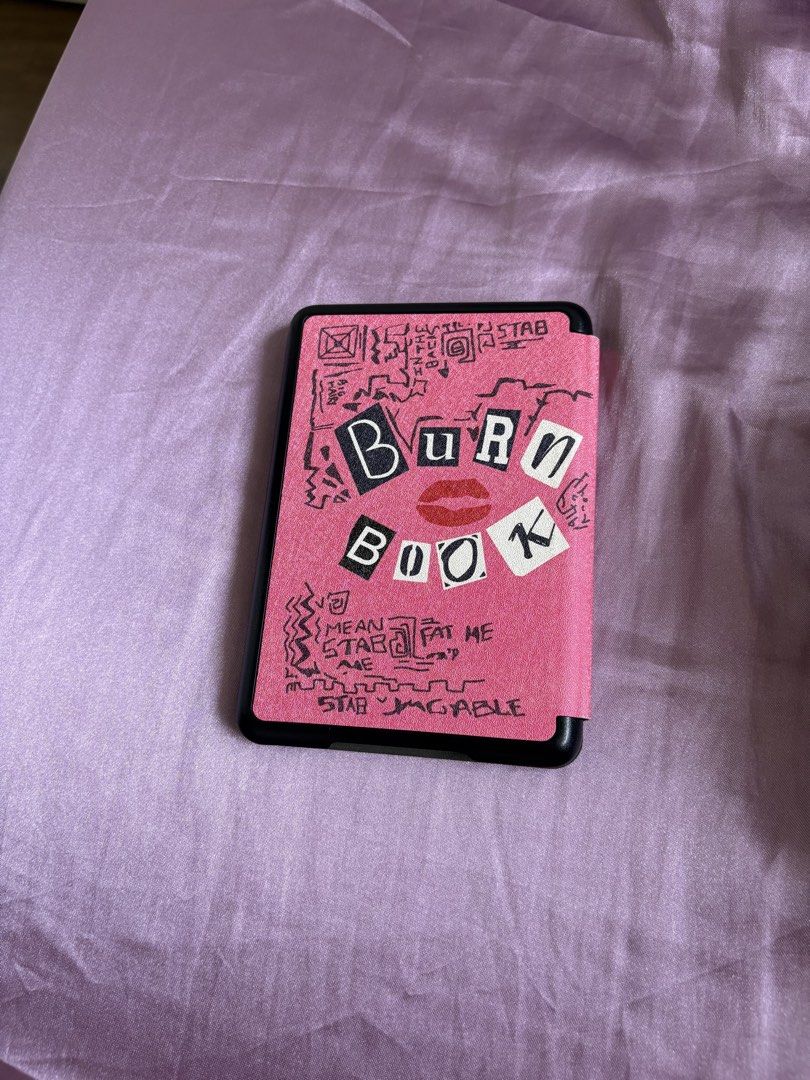 Pink Kindle Case [Kindle 11th (C2V2L3/ RS23CV)] (Category: Laptop Bags & Sleeves) located in Pasay City. Submitted by polly.unpockets (Listing ID 1464398319, Image 3). Description: Mean Girls Burn Book design kindle case.