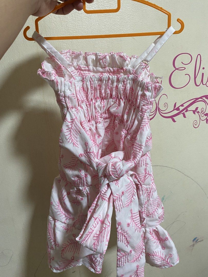 Pink Leaf Print Pet Dress with Ruffles (Category: Babies & Kids Fashion) located in Manila. Submitted by chingsenallertse (Listing ID 1464433809, Image 2). Description: - Cute pink and white pet dress - Features a lovely leaf print all over - Ruffled neckline and hem for extra flair - Ties at the back with a sweet bow - Adorable for your furry friend - Great for everyday walks or special occasions.