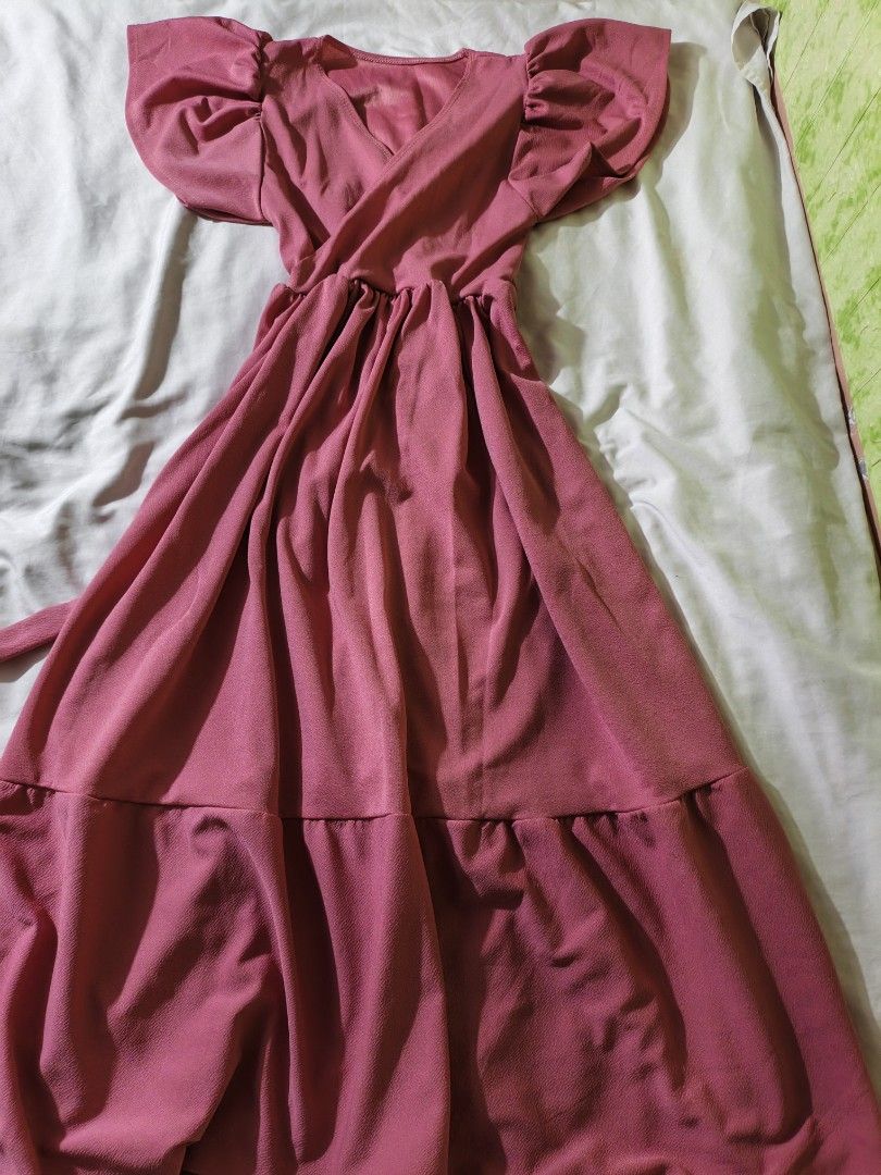 Pink Puff Sleeve Wrap Maxi Dress (Category: Dresses) located in Manila. Submitted by ms_pamaqued (Listing ID 1464355124, Image 1). Description: - Flowy pink maxi dress - Flattering wrap front - Cute puff sleeves - Elasticated waist - Tiered skirt - Versatile: great for parties or casual days out - Easy to style.