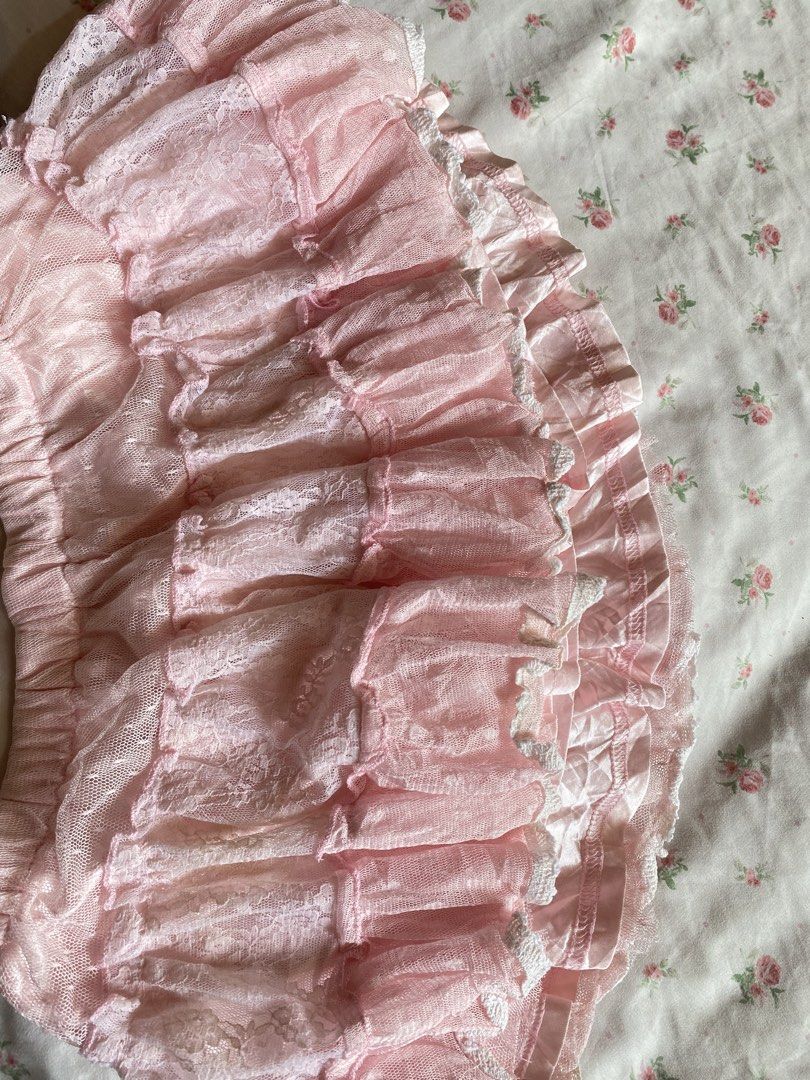 Pink Ruffle Lace Skirt with Drawstring Waist (Category: Skirts) located in Iloilo. Submitted by kumiyuiz (Listing ID 1464493148, Image 3). Description: - Adorable pink lace skirt - Features multiple ruffles and lace trim - Comfortable elastic waistband with a white drawstring - Includes a satin lining for a smooth feel - Ideal for achieving a sweet or cottagecore aesthetic - A fun and flirty addition to your wardrobe.