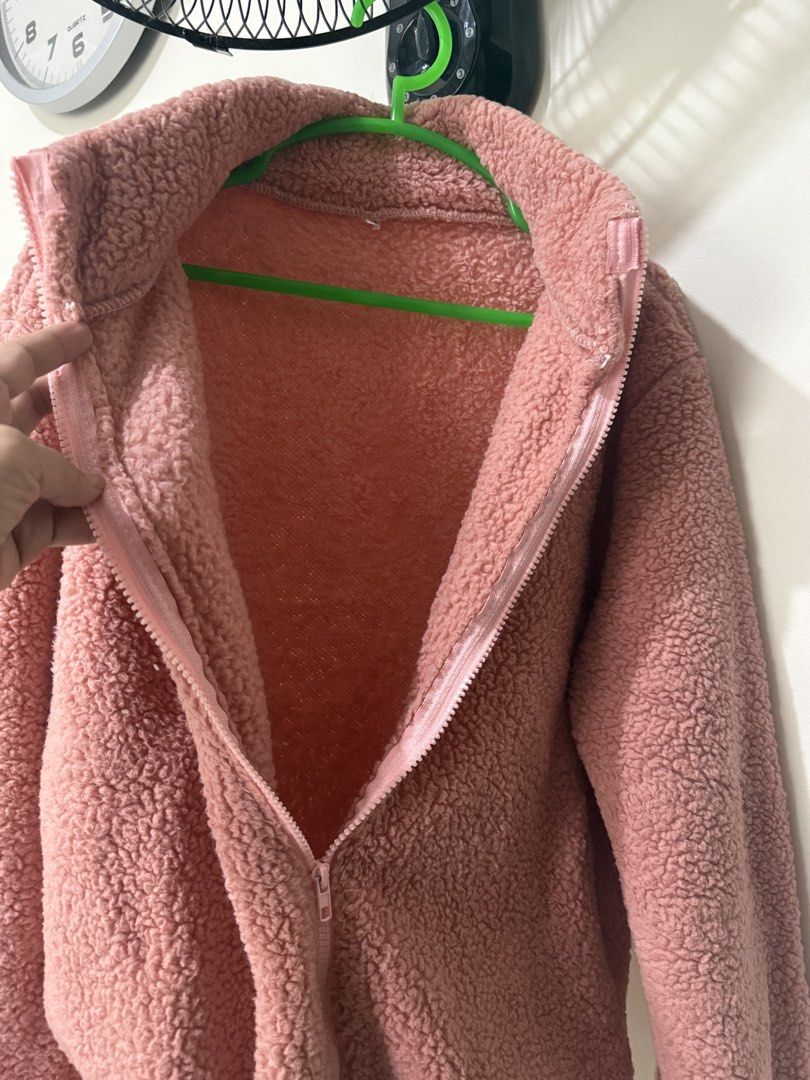 Pink Teddy Fleece Zip-Up Jacket fits medium (Category: Coats, Jackets and Outerwear) located in Cavite. Submitted by galoreforsale (Listing ID 1464437755, Image 3). Description: - Super soft pink teddy fleece material - Full zip-up front - Stand-up collar - Ideal for staying warm and cozy - Great for layering over tops - Easy to wear for casual outings.