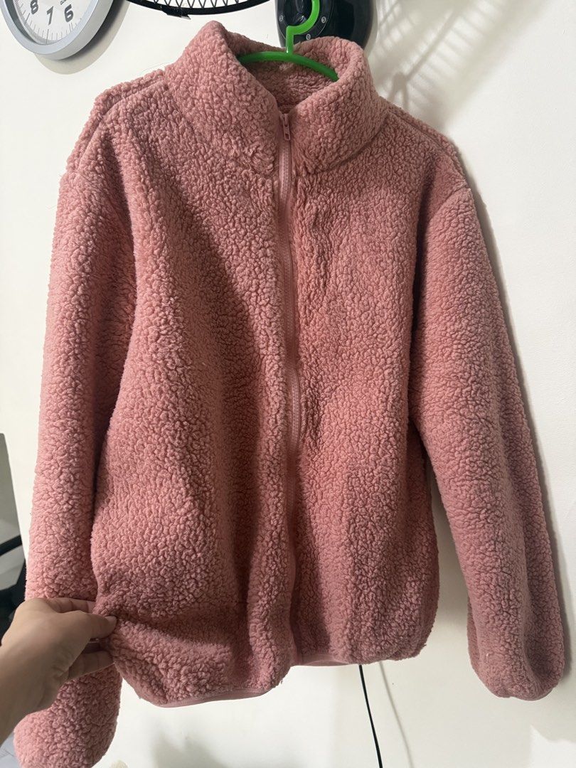 Pink Teddy Fleece Zip-Up Jacket fits medium (Category: Coats, Jackets and Outerwear) located in Cavite. Submitted by galoreforsale (Listing ID 1464437755, Image 2). Description: - Super soft pink teddy fleece material - Full zip-up front - Stand-up collar - Ideal for staying warm and cozy - Great for layering over tops - Easy to wear for casual outings.