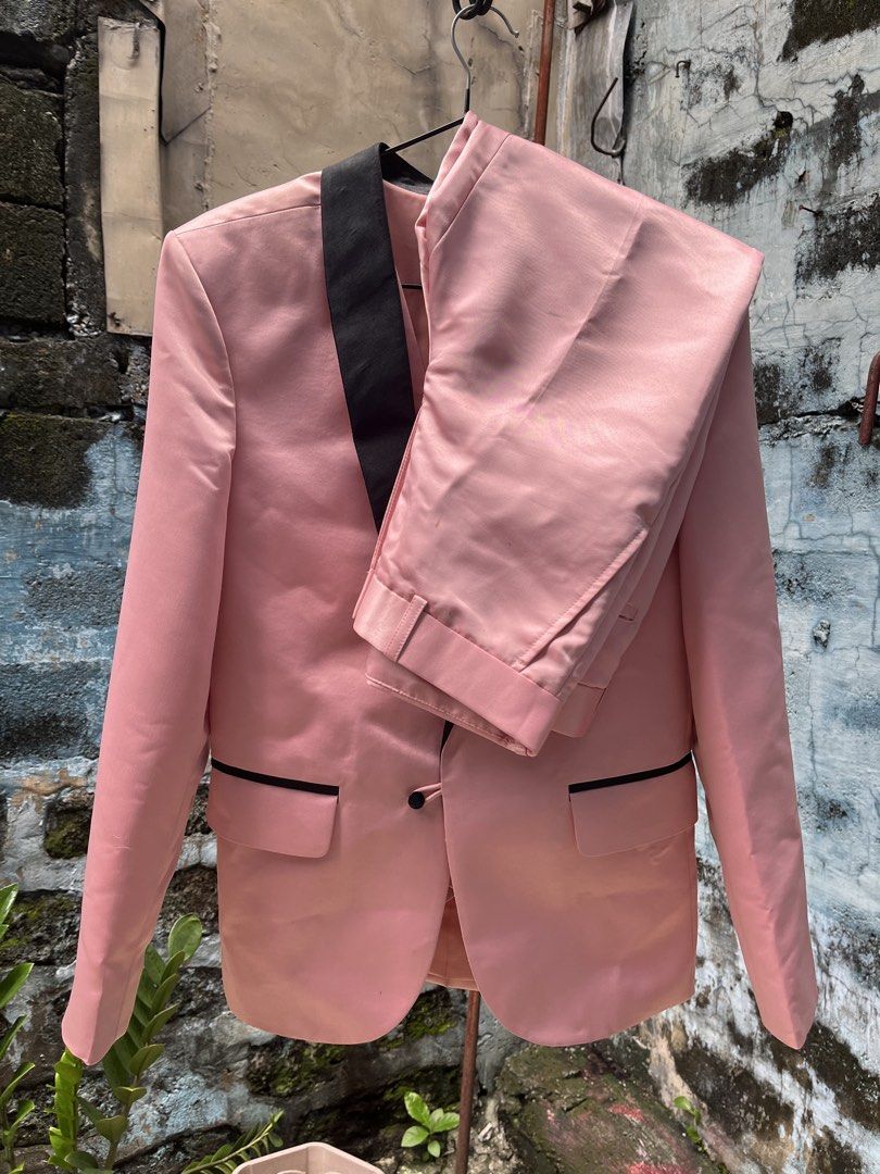 Pink Tuxedo Suit with Black Lapels (Category: Coats, Jackets and Outerwear) located in Manila. Submitted by odysseus_774 (Listing ID 1464392489, Image 2). Description: Selling a pink tuxedo suit. Includes a blazer and matching pants. The blazer has black satin lapels and pocket trim. The pants also have black trim. Great for parties or special occasions. Looks sharp and stylish..