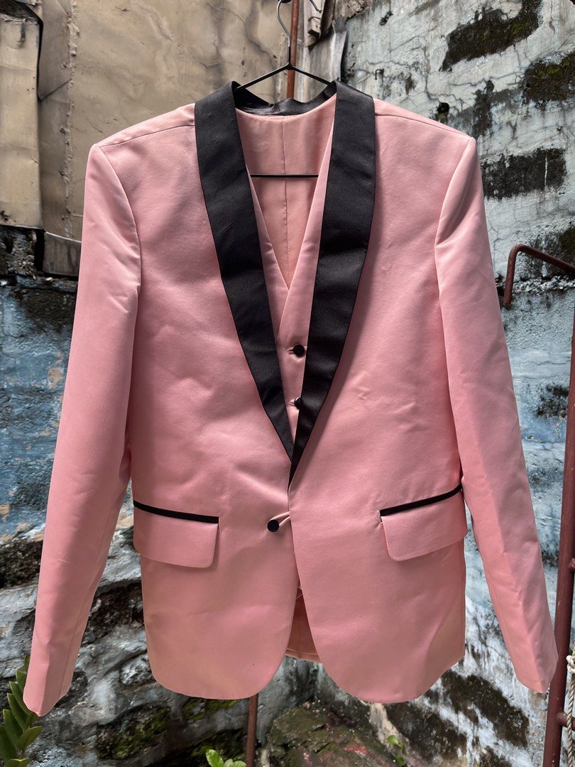 Pink Tuxedo Suit with Black Lapels (Category: Coats, Jackets and Outerwear) located in Manila. Submitted by odysseus_774 (Listing ID 1464392489, Image 1). Description: Selling a pink tuxedo suit. Includes a blazer and matching pants. The blazer has black satin lapels and pocket trim. The pants also have black trim. Great for parties or special occasions. Looks sharp and stylish..