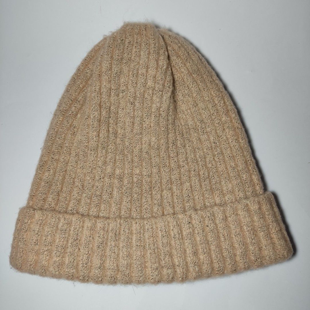 Pink-Brown Ribbed Knit Beanie (Category: Hats & Beanies) located in Bacoor. Submitted by kmrynl (Listing ID 1464417511, Image 1). Description: Rfs: decluttering - no issue - thick and stretchy MOP: BPI/Maribank only MOD: J&T/Lalamove.