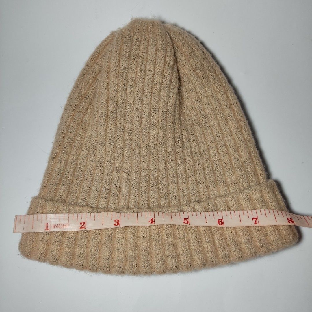 Pink-Brown Ribbed Knit Beanie (Category: Hats & Beanies) located in Bacoor. Submitted by kmrynl (Listing ID 1464417511, Image 3). Description: Rfs: decluttering - no issue - thick and stretchy MOP: BPI/Maribank only MOD: J&T/Lalamove.