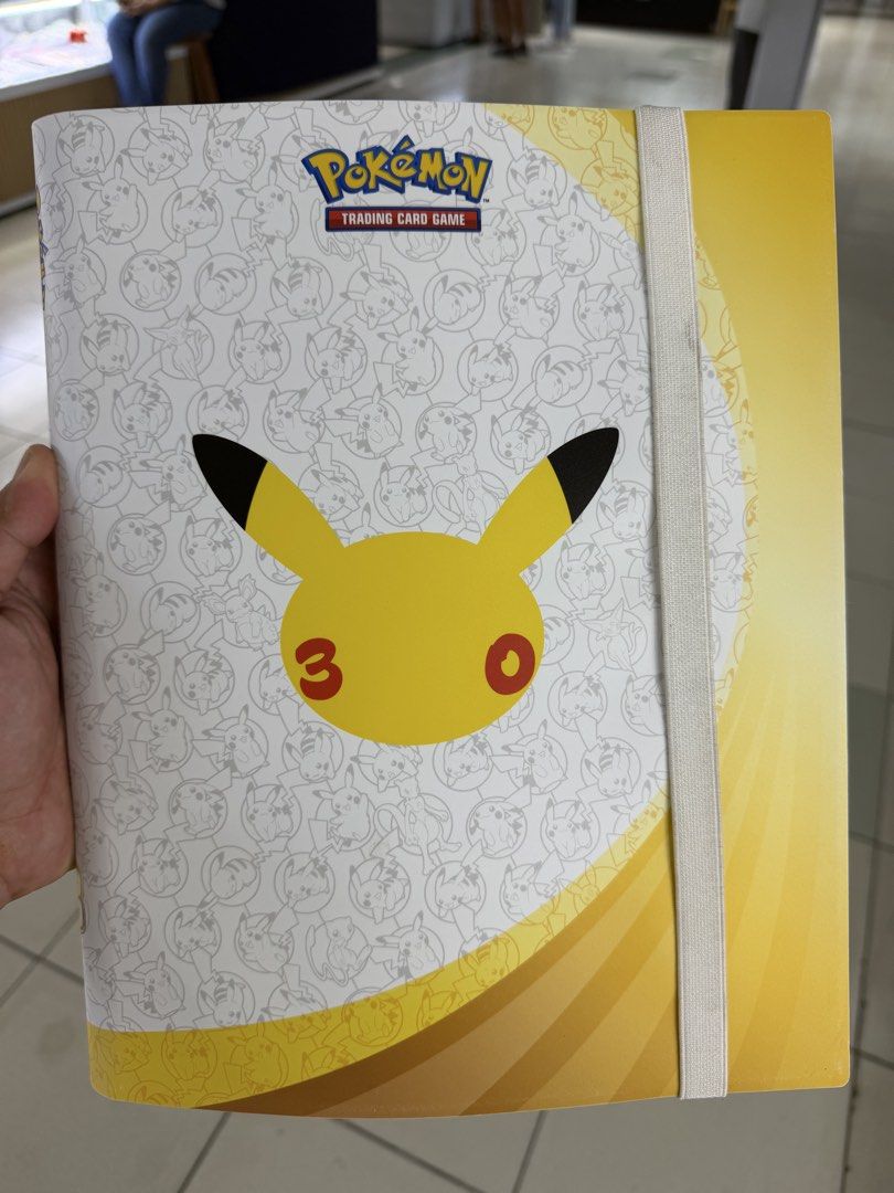 Pokemon 30th celebration binder used with postee (Category: Trading Cards Accessories) located in San Juan City. Submitted by royceee (Listing ID 1464378838, Image 1). Description: .