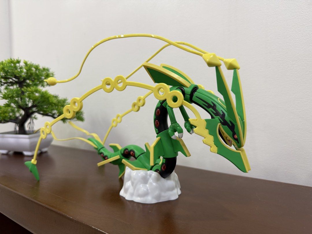 Pokemon Mega Rayquaza Action Figure (Category: Figurines & Statues) located in Quezon City. Submitted by Ragnarokk (Listing ID 1464503118, Image 1). Description: - Cool Rayquaza figure - Features green and yellow colors - Includes a cloud display base - Ideal for any Pokemon fan - Great display piece.