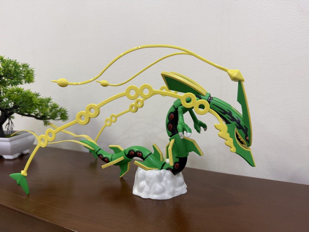 Pokemon Mega Rayquaza Action Figure (Category: Figurines & Statues) located in Quezon City. Submitted by Ragnarokk (Listing ID 1464503118, Image 2). Description: - Cool Rayquaza figure - Features green and yellow colors - Includes a cloud display base - Ideal for any Pokemon fan - Great display piece.