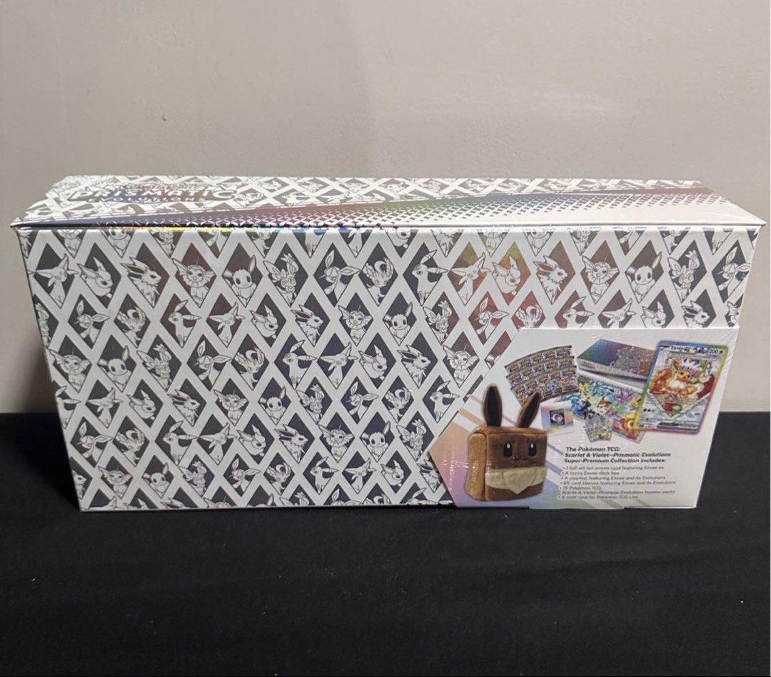 Pokémon Scarlet & Violet—Prismatic Evolutions SPC (Category: Card Boxes & Cases) located in Manila. Submitted by geofmloza (Listing ID 1464460039, Image 2). Description: Selling authentic, factory-sealed Pokémon TCG Prismatic Evolutions Super-Premium Collection (SPC) boxes. Fresh, untampered original shrink wrap in pristine condition! BOX DETAILS: Condition: Factory Sealed / Brand New Quantity: 2 Boxes Available Price: ₱17,400 per box INCLUDES (P