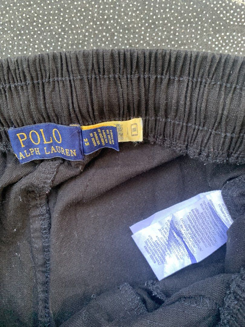 Polo Ralph Lauren Black Drawstring Pants Size M (Category: Coats, Jackets and Outerwear) located in Cebu City. Submitted by xrm12 (Listing ID 1464492161, Image 3). Description: - Brand: Polo Ralph Lauren - Color: Black - Size: M - Features: Elastic waistband with drawstring, straight leg fit - Detail: Small red pony logo on the front - Origin: Made in Vietnam - Style: Great for casual wear.