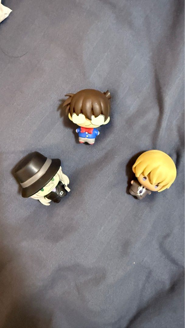 [POPMART] Detective Conan Chibi Figurines Set (Category: Figurines & Statues) located in Davao. Submitted by furuya_tsuyoshi (Listing ID 1464468165, Image 1). Description: - Set of 3 Detective Conan chibi figurines - Includes Conan, Rei Furuya and Gin - Comes with original packaging - Ideal for fans of the Detective Conan series CONAN - 20 pesos Rei Furuya- 200 pesos Gin - 200 pesos Take all - 500 + sf.