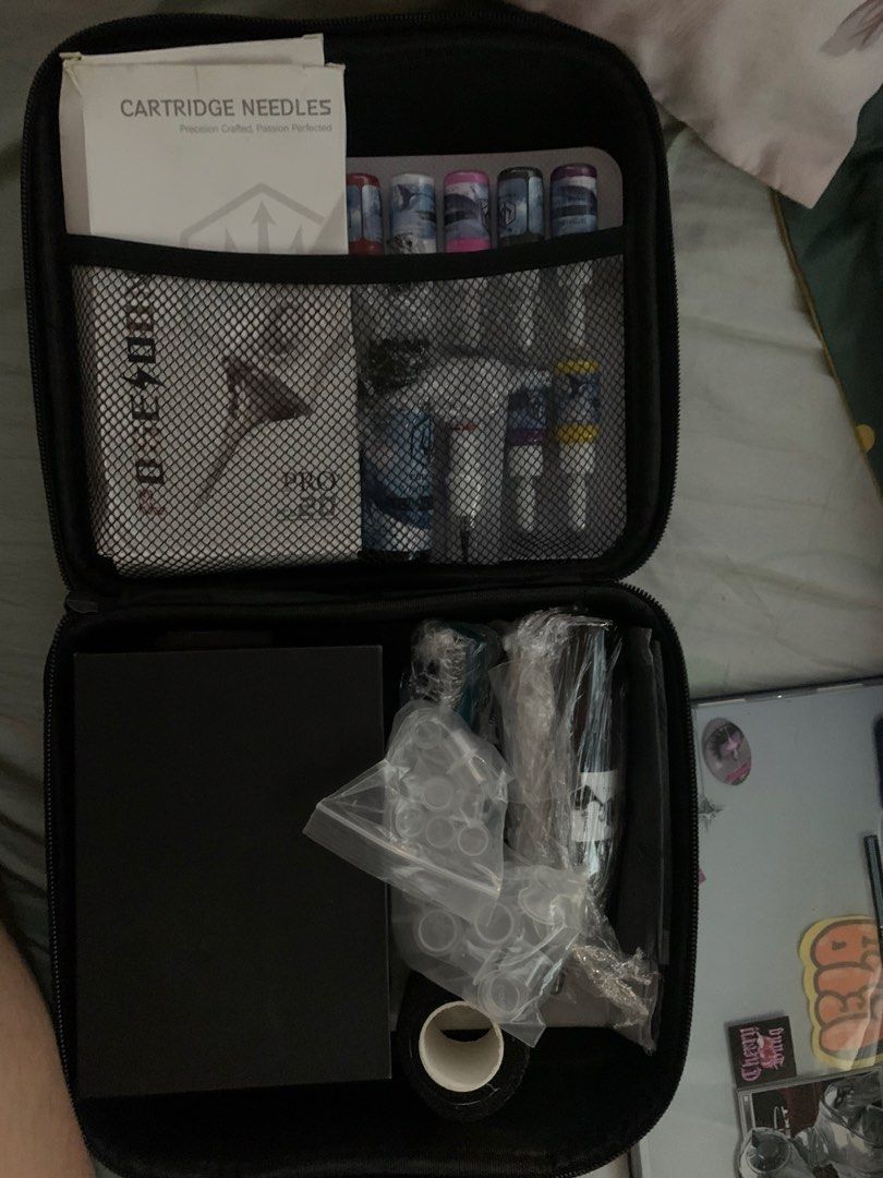 Poseidon Tattoo Machine Set (Category: Craft Supplies & Tools) located in Pasay City. Submitted by bdrlela (Listing ID 1464360267, Image 3). Description: - Poseidon Tattoo Machine Pen (Rose Gold & Black) - Complete Kit: Includes case, cartridge needles, ink, and other essential accessories - Digital Display: Features voltage and timer for precise control - Ideal for Beginners: Great for artists starting their tattoo journey - Upgrade Option: Suit