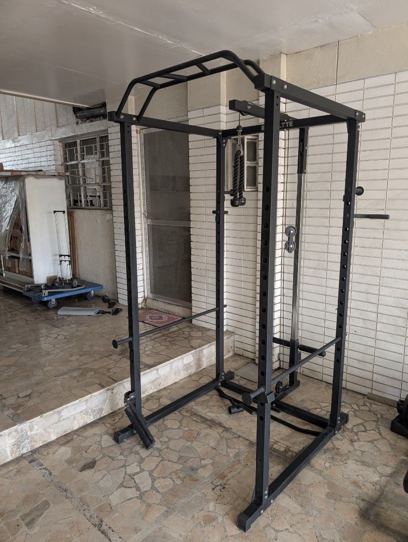 Power Cage Home Gym (Category: Other Sports Equipment and Supplies) located in Marikina City. Submitted by mrtncdrc (Listing ID 1464373900, Image 1). Description: It is currently assembled so please bring someone who can disassemble it upon pickup if needed. Minor surface rust that can easily be removed.