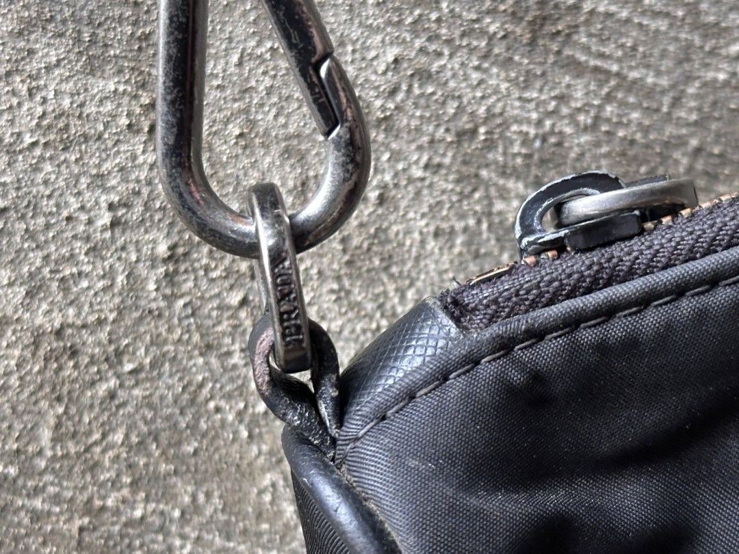 Prada Crossbody Econylon (Category: Cross-body Bags) located in Talisay. Submitted by bigheaddrake (Listing ID 1464475248, Image 3). Description: Prada Econylon Oxidations on hardwares No other issues 7/10 Condi.