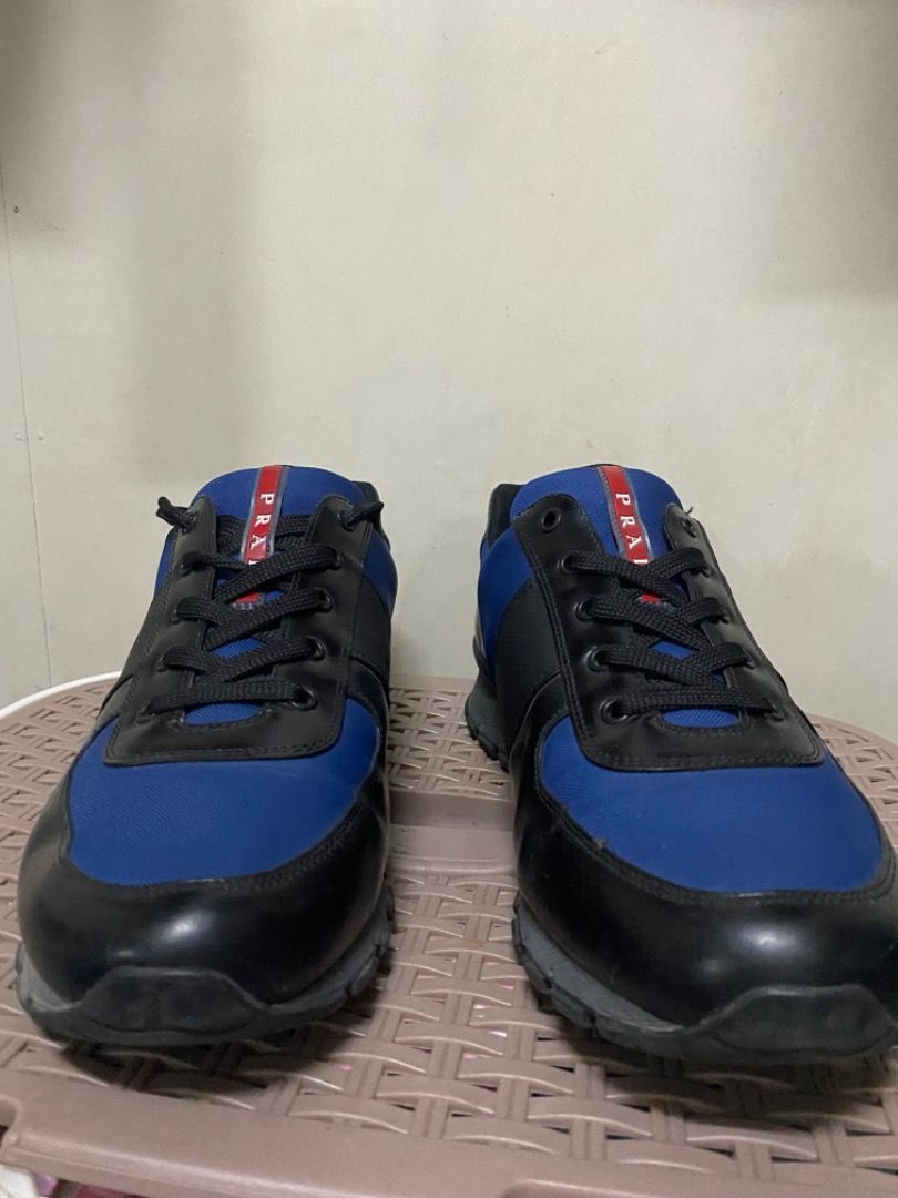 Prada Red Tab Low-Top Sneakers (Category: Sneakers & Footwear) located in San Mateo. Submitted by prelovedstuffsbycha (Listing ID 1464360085, Image 1). Description: Prada Red Tab Low-Top Sneakers (4E2718) ₱4000 Size: 11 US Still in good condition — no major flaws, just normal signs of use. No box included. 📍Location: San Mateo, Rizal Available for pick up or delivery (buyer’s cost). Message me if interested!.