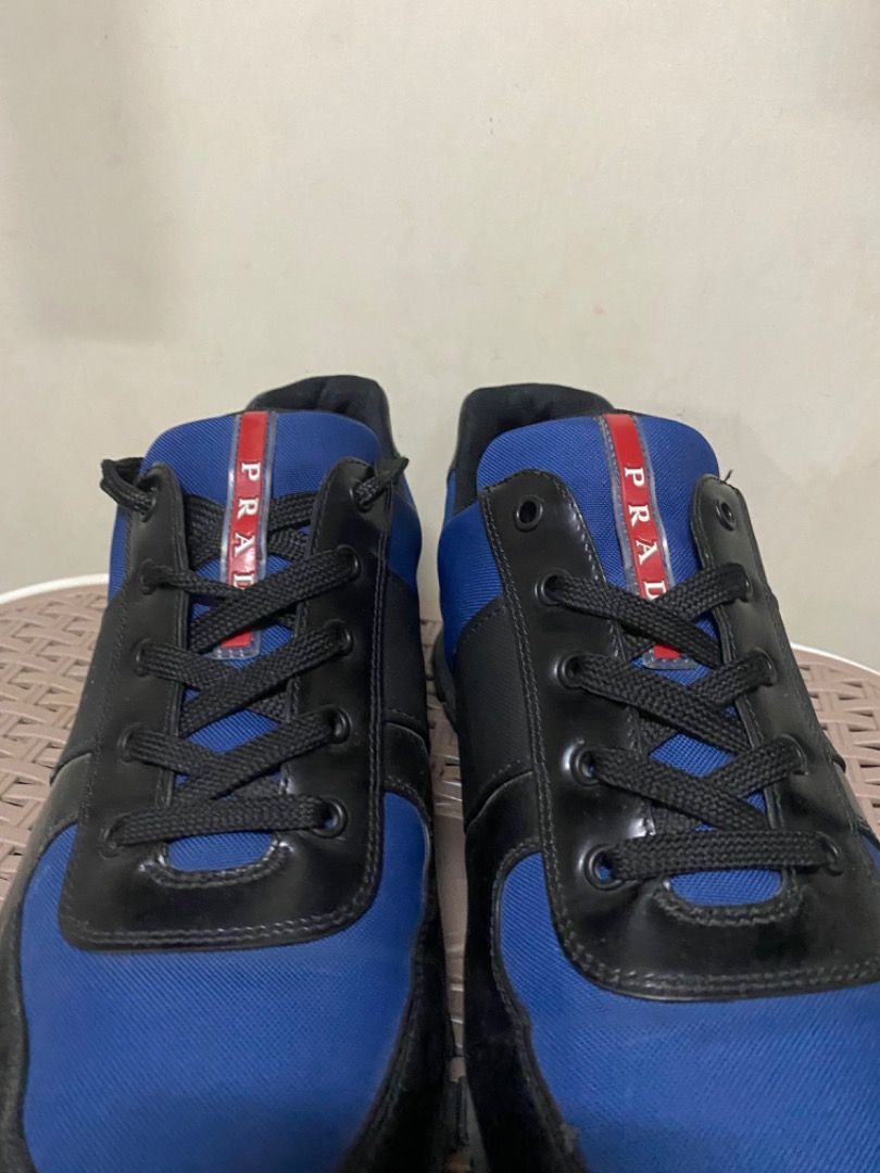 Prada Red Tab Low-Top Sneakers (Category: Sneakers & Footwear) located in San Mateo. Submitted by prelovedstuffsbycha (Listing ID 1464360085, Image 3). Description: Prada Red Tab Low-Top Sneakers (4E2718) ₱4000 Size: 11 US Still in good condition — no major flaws, just normal signs of use. No box included. 📍Location: San Mateo, Rizal Available for pick up or delivery (buyer’s cost). Message me if interested!.