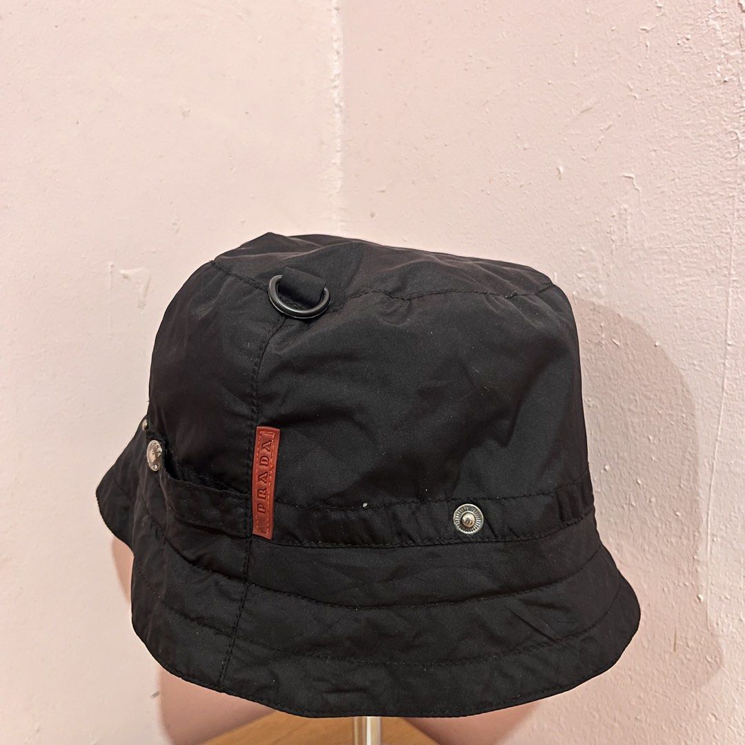 Prada Sport Red tab nylon bucket hat (Category: Luxury Apparel) located in Bacolod City. Submitted by rndm.wears (Listing ID 1464522785, Image 3). Description: Prada Sport Red Tab Nylon Bucket Hat OSFA no issues.