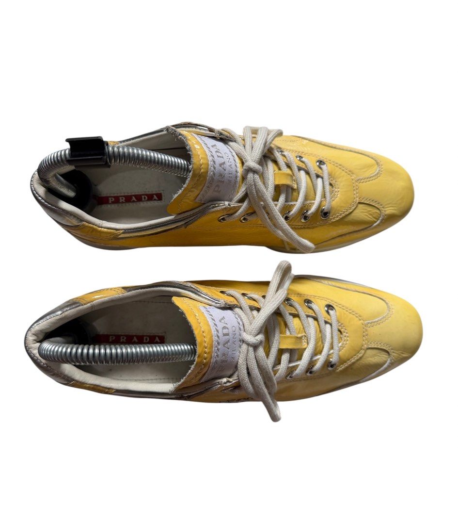 PRADA TRAINERS YELLOW PATENT SNEAKERS (Category: Sneakers & Footwear) located in Baguio. Submitted by kds_stuffs (Listing ID 1464494570, Image 2). Description: Mine: 1.5k 📍PR4D4 trainers yellow patent sneakers 😍 Super comfy and super nice in actual 👌 Coded Size: 37 Needs cleaning Excellent condition Gandara neto 💗.