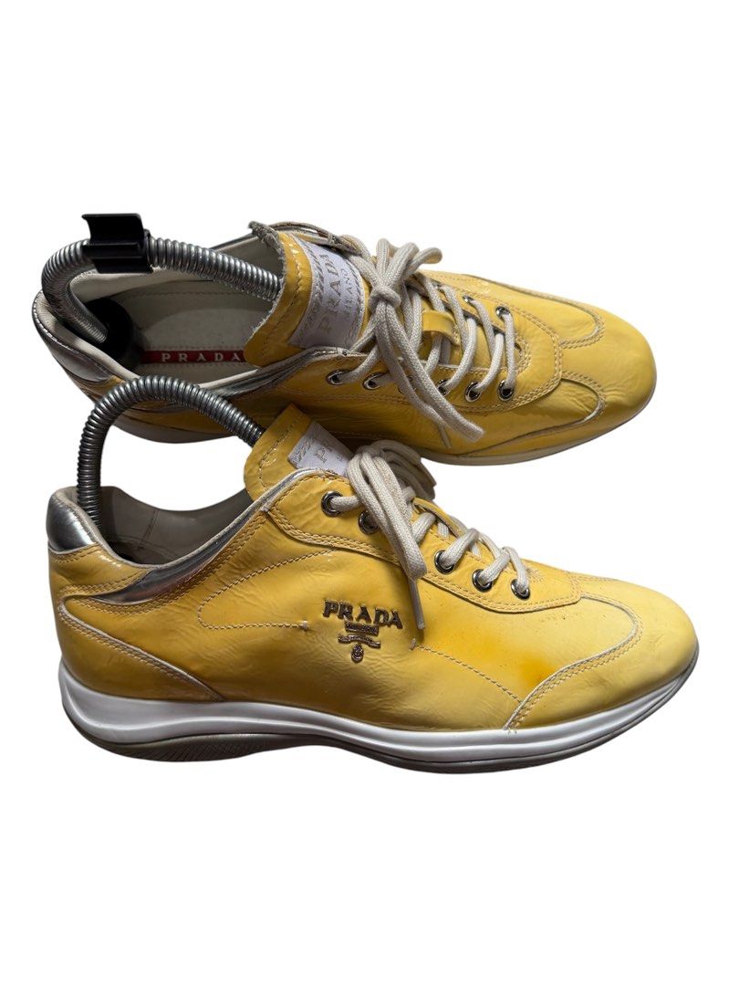 PRADA TRAINERS YELLOW PATENT SNEAKERS (Category: Sneakers & Footwear) located in Baguio. Submitted by kds_stuffs (Listing ID 1464494570, Image 1). Description: Mine: 1.5k 📍PR4D4 trainers yellow patent sneakers 😍 Super comfy and super nice in actual 👌 Coded Size: 37 Needs cleaning Excellent condition Gandara neto 💗.