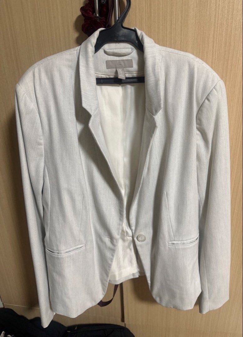 Preloved authentic H&M shoulder padded Textured Blazer (Category: Coats, Jackets and Outerwear) located in Binan City. Submitted by unicohijoxfudge (Listing ID 1464389525, Image 1). Description: - H&M shoulder padded Blazer - Textured Fabric - Single Button Closure - Two Front Pockets - Fully Lined Interior - Ideal for Smart Casual & Office Wear - Versatile and Easy to Style Tagged eur 42 Tags: Burberry Calvin Klein Coach Michael Kors Kate Spade 