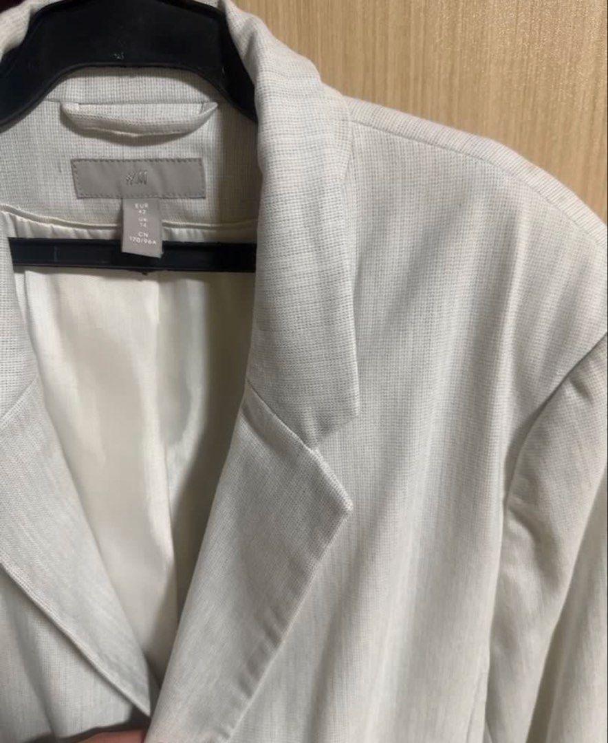 Preloved authentic H&M shoulder padded Textured Blazer (Category: Coats, Jackets and Outerwear) located in Binan City. Submitted by unicohijoxfudge (Listing ID 1464389525, Image 3). Description: - H&M shoulder padded Blazer - Textured Fabric - Single Button Closure - Two Front Pockets - Fully Lined Interior - Ideal for Smart Casual & Office Wear - Versatile and Easy to Style Tagged eur 42 Tags: Burberry Calvin Klein Coach Michael Kors Kate Spade 