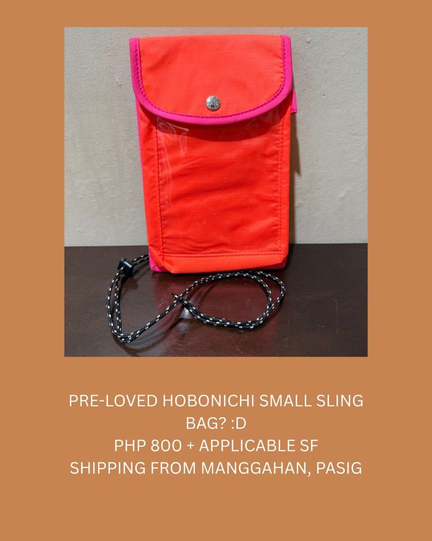 Pre-loved Hobonichi Small Sling Bag (Category: Cross-body Bags) located in Pasig City. Submitted by boredtakoyaki (Listing ID 1464383698, Image 1). Description: - Pre-loved Hobonichi small sling bag - Bright orange with pink trim - Features a clear front pocket - Comes with a black and white cord strap - Ideal for carrying essentials on the go - Shipping from Manggahan, Pasig - Price: PHP 800 (plus shipping fees).