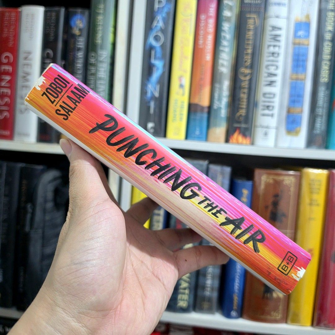 Punching the Air by Ibi Zoboi (Hardbound) (Category: Storybooks) located in Makati City. Submitted by vladcpa (Listing ID 1464407936, Image 2). Description: PLEASE READ CAREFULLY BEFORE BUYING ☺ 💵 MOP: B P I or Gc@sh 🚚 MOD: J&T or Lalam0ve / Grqb within Metro Manila 📕 With tanning ✔️ Payment first before same day delivery ✔️ No haggling, please (last price posted, discounted already) ‼️ ✔️ Swipe left for more photos—all sides of the product ar