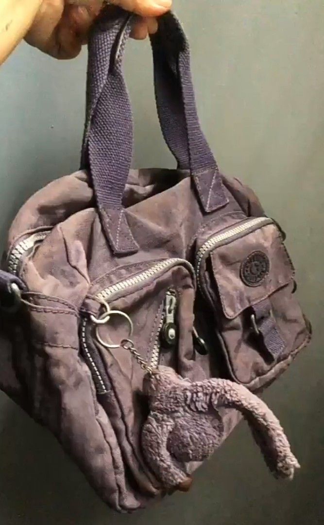 Purple Kipling sling/handbag (Category: Cross-body Bags) located in Manila. Submitted by jhulllibhe_003 (Listing ID 1464496434, Image 1). Description: .
