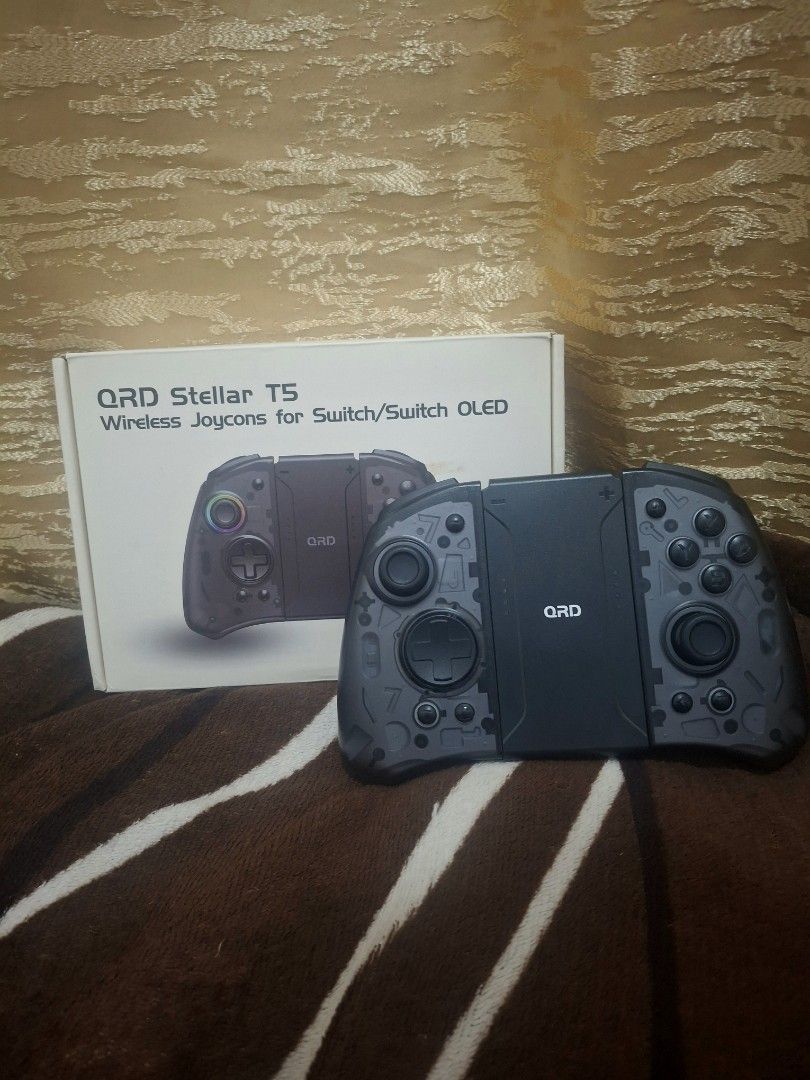 QRD STELLAR T5 Joy-cons for Nintendo Switch (Category: Controllers) located in Pasig City. Submitted by braveeagle-b500 (Listing ID 1464396454, Image 1). Description: QRD STELLAR T5 JOY-CONS FOR SALE 🎮 No issues, all working With built-in rgb lights, extra back buttons, hall effect joysticks and can be used wireless With attachment grip PRICE : ₱2k PM for more details and offers 💬.