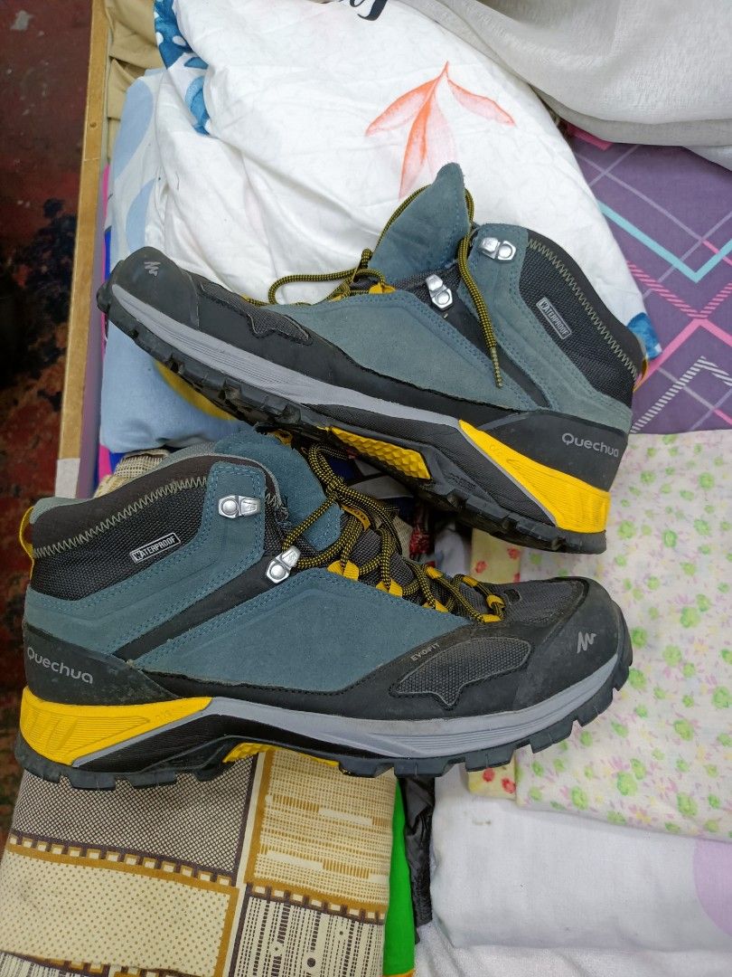 Quechua Waterproof Hiking Boots (Category: Boots) located in Manila. Submitted by pnjdianne25879 (Listing ID 1464568419, Image 1). Description: - Quechua Mid-Cut Hiking Boots - Waterproof Material - Size: UK 9.5 / EU 44 - Color: Yellow and Grey - Perfect for Trails and Outdoor Adventures - Features Evofit Technology - Equipped with Crosscontact Sole.
