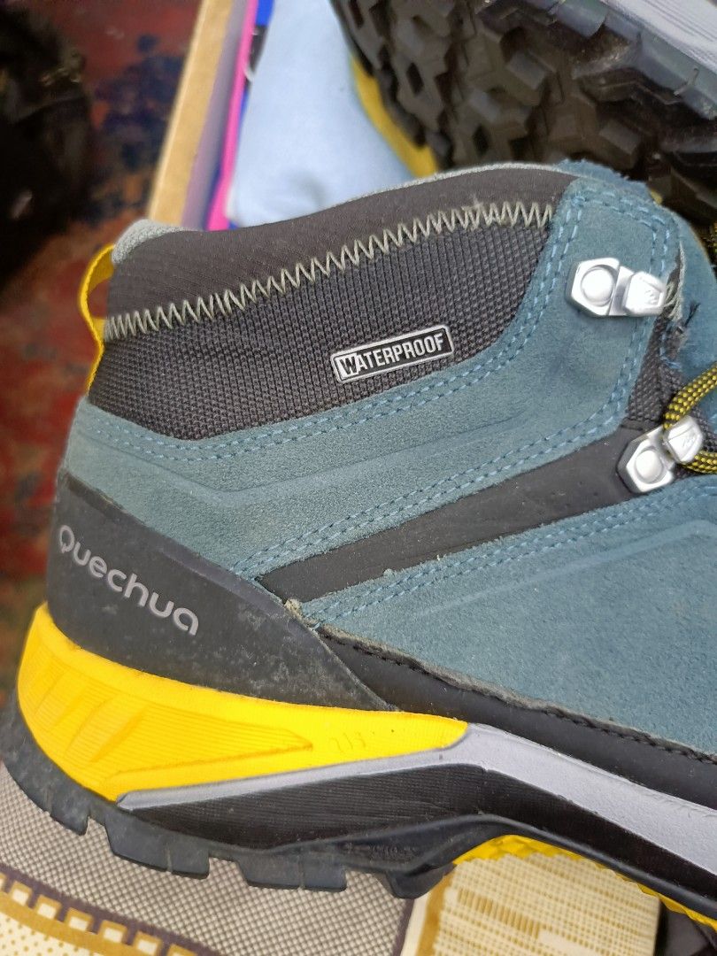 Quechua Waterproof Hiking Boots (Category: Boots) located in Manila. Submitted by pnjdianne25879 (Listing ID 1464568419, Image 3). Description: - Quechua Mid-Cut Hiking Boots - Waterproof Material - Size: UK 9.5 / EU 44 - Color: Yellow and Grey - Perfect for Trails and Outdoor Adventures - Features Evofit Technology - Equipped with Crosscontact Sole.