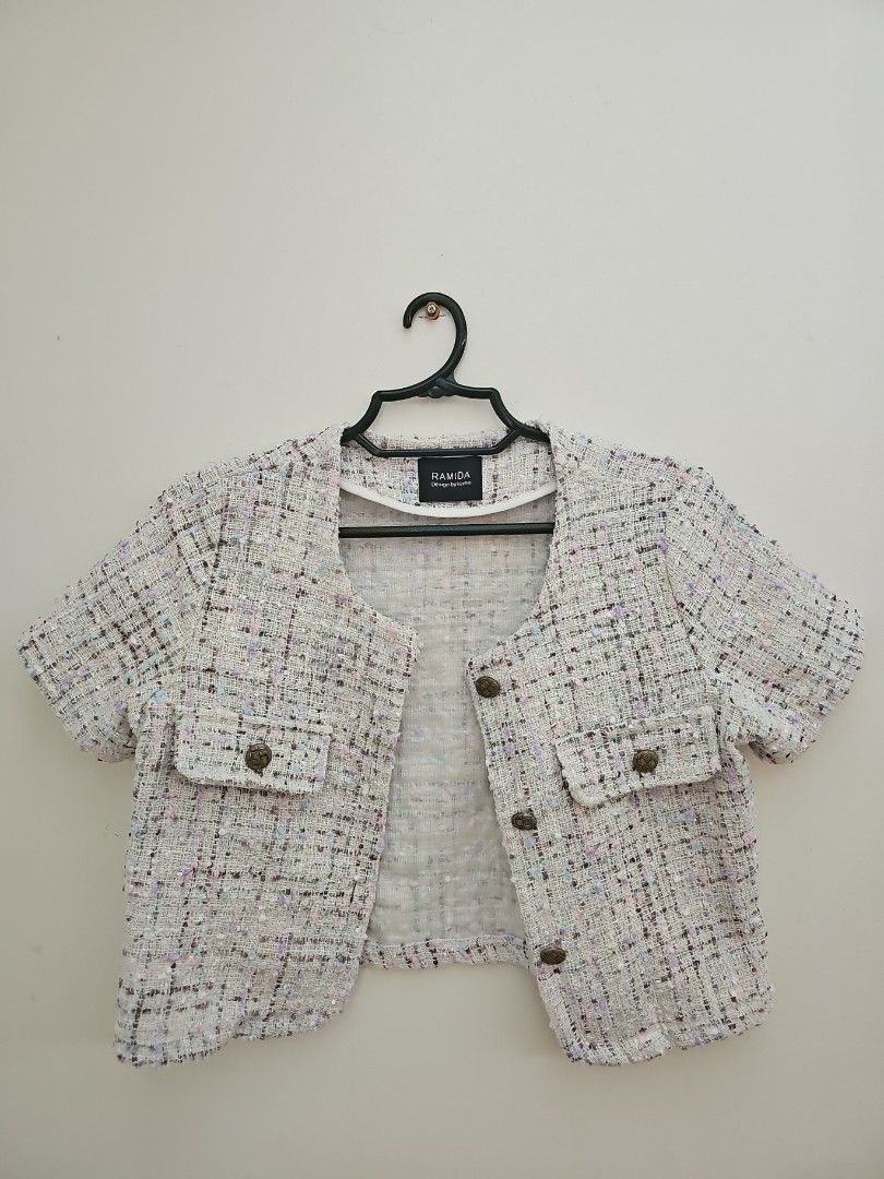 RAMIDA Design by Korea Tweed Cropped Jacket (Category: Coats, Jackets and Outerwear) located in Muntinlupa City. Submitted by shoptitak (Listing ID 1464396913, Image 1). Description: - Cute cropped tweed jacket from RAMIDA - Textured fabric with multi-colored threads - Front button closures - Versatile for layering over tops or dresses - Adds a chic touch to any outfit.