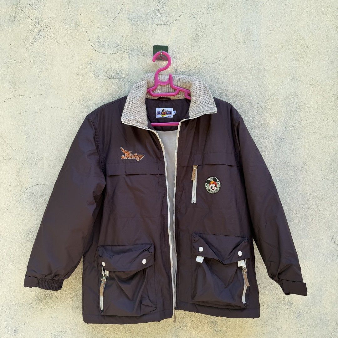 Rare Vintage Mickey Mouse Motorcycle Jacket (Category: Coats, Jackets and Outerwear) located in Bangued. Submitted by c.ceekay (Listing ID 1464488223, Image 1). Description: ​Vintage Mickey Mouse Motorcycle Club Jacket size 14 kids ( pwede po pang adult) small to medium kasya Dark brown utility jacket featuring embroidered "Mickey" chest graphic, vintage Mickey Motorcycle patch, high neck collar, and tons of pocket details. Perfect piece for stre