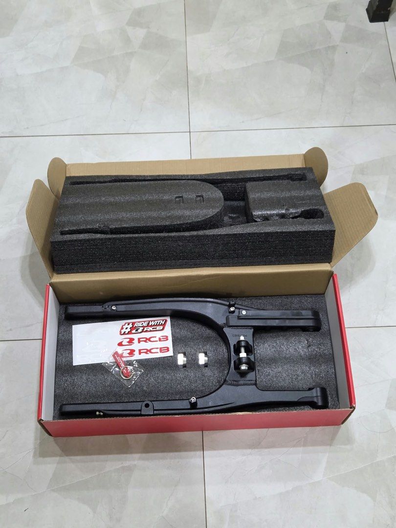 RCB Forged Swing Arm Black (Category: Body Parts and Accessories) located in Manila. Submitted by christinen15655 (Listing ID 1464375389, Image 3). Description: 🏍️ FOR SALE: RCB Forged Swing Arm for Yamaha Sniper 150/155 🏍️ ✅ Brand New ✅ Kabibili lang ✅ Never installed / Never used ✅ Complete with original box ✅ Original RCB Racing Boy.
