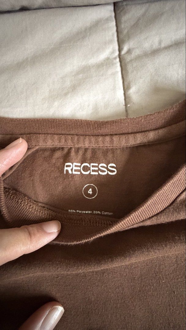 Recess Cropped Boxy Tee (Category: Shirts) located in Makati City. Submitted by nisayaptinchay (Listing ID 1464367033, Image 1). Description: - Brand: Recess - Color: Brown - Size: 4 - Material: 65% Polyester, 35% Cotton - Style: Simple and comfortable - Ideal for: Everyday wear.