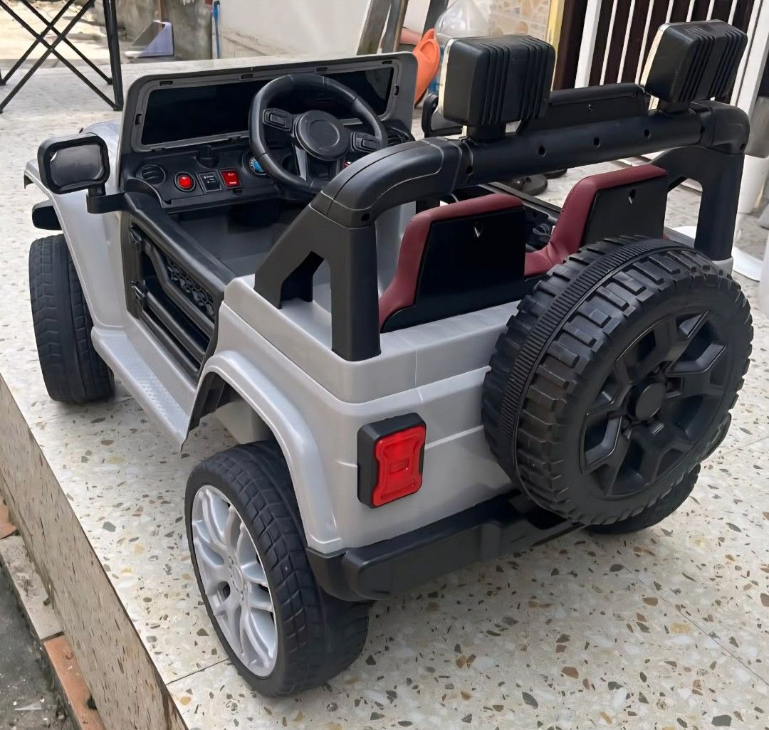 Rechargeable Jeep Toy Car (Category: Remote Control Toys) located in Quezon City. Submitted by a.celistine (Listing ID 1464487179, Image 3). Description: For Sale❗️❗️ Bought last Nov 2025 but used only less than 10x. Original SRP: 6,750 Selling Price: 4,000 RFS: Barely used lang ng toddler ko, prefer mag bike and scooter Issue - may scratch sa leather seat. see photo for reference. For meetup, Malolos area Model LT-598 - Features: Includes leathe