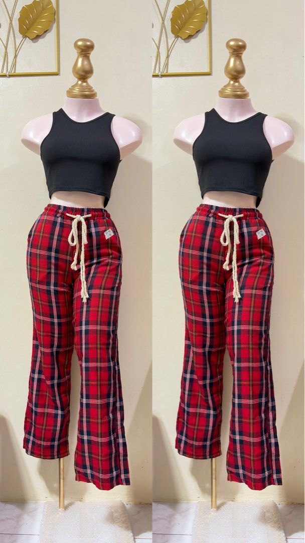 Red Plaid Lounge Pants with Drawstring Waist (Category: Joggers) located in Manila. Submitted by thrift.buddy.em (Listing ID 1464562533, Image 1). Description: - Comfy red plaid pants - Drawstring waist for a great fit - Wide leg style, ideal for lounging - Tag indicates size M - Versatile for home relaxation or casual outings.