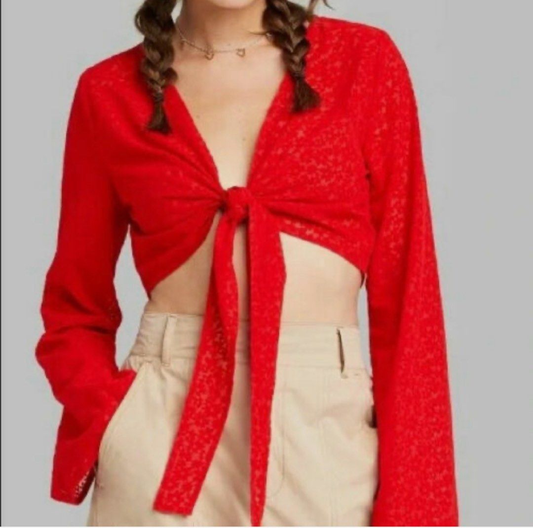 Red Tie-Front Long Sleeve Crop Top (Category: Longsleeves) located in Naga. Submitted by cozydapper (Listing ID 1464428395, Image 2). Description: - Cute red tie-front crop top - Long bell sleeves - Textured fabric with subtle pattern - Pairs well with jeans or high-waisted pants - Perfect for casual days or nights out.