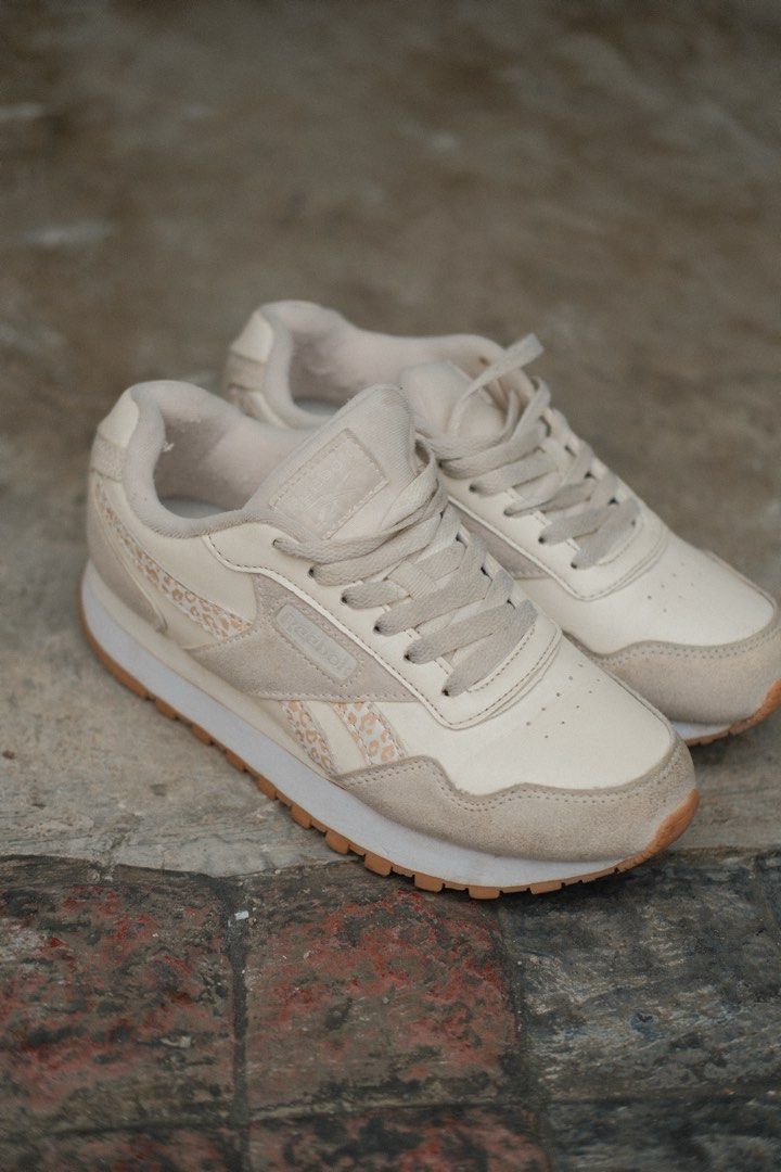Reebok Classic Glide Ripple Leopard Print Sneakers (Category: Sneakers) located in Quezon City. Submitted by crslph (Listing ID 1464414247, Image 1). Description: - Cream and beige Reebok Classic Leather sneakers - Features subtle leopard print accents on the side panels - Classic silhouette with a durable gum sole - Secure lace-up closure - Ideal for everyday casual wear - No box - Rfs decluttering.