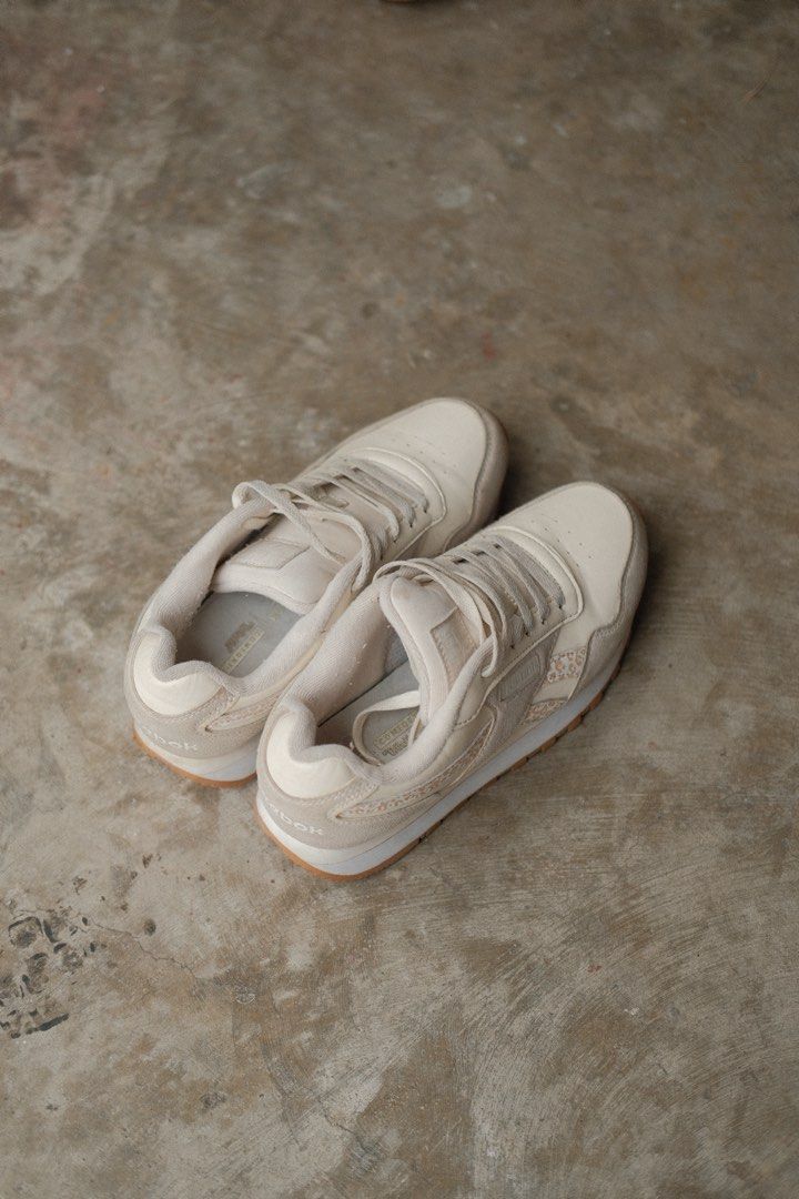 Reebok Classic Glide Ripple Leopard Print Sneakers (Category: Sneakers) located in Quezon City. Submitted by crslph (Listing ID 1464414247, Image 3). Description: - Cream and beige Reebok Classic Leather sneakers - Features subtle leopard print accents on the side panels - Classic silhouette with a durable gum sole - Secure lace-up closure - Ideal for everyday casual wear - No box - Rfs decluttering.