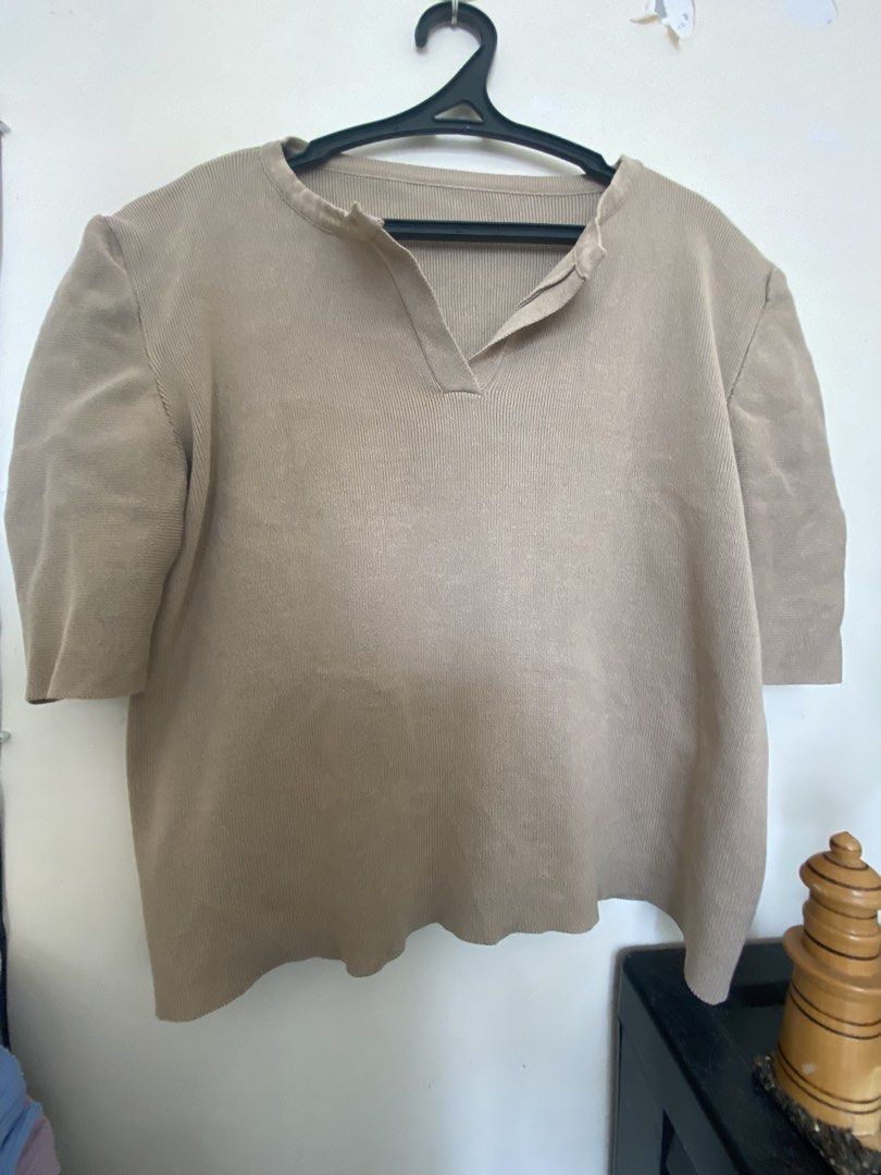 Ribbed Knit Tops - Various Colors (Category: Sleeveless) located in Cavite. Submitted by goldenbear.3e82a9 (Listing ID 1464403670, Image 1). Description: - Bundle includes 4 ribbed knit tops. - Colors: Beige, Light Pink, Light Blue, Lavender. - All tops are short-sleeved. - Features unique necklines: some with collars, V-necks, or button-up fronts. - Versatile for casual outfits or layering. - Easily mix and match with different bottoms..