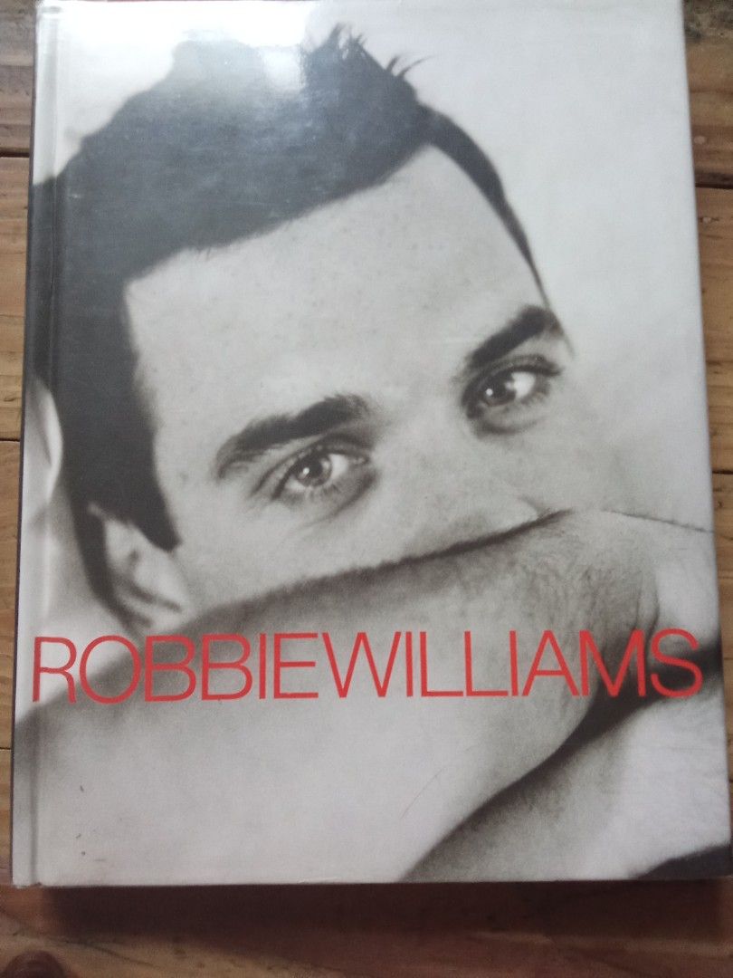 Robbie Williams autobiography hardcover book (Category: Storybooks) located in Pasig City. Submitted by teebeedeee (Listing ID 1464569470, Image 1). Description: preowned hardcover book complete full colored glossy pages plastic covered.no visible penmarks.visible sticker mark sa back cover for meetups in pasig rotonda or jnt shipping or lalamove grab payment via gcash or lalamove grab or unionbank .