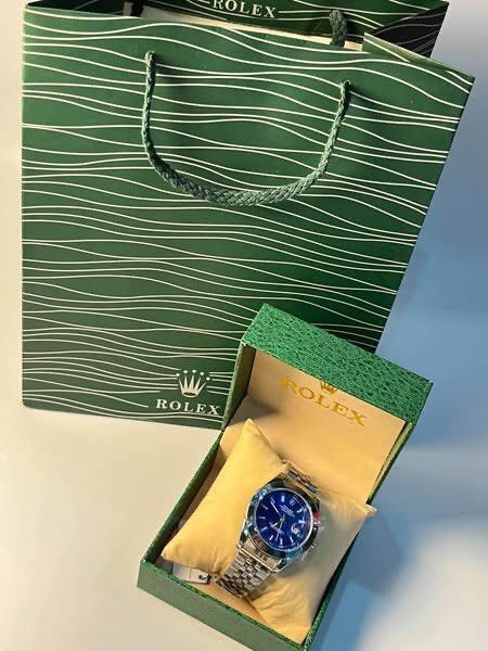 ROLEX!!! (Category: Men's Watches) located in Mexico. Submitted by liora.lux (Listing ID 1464497346, Image 3). Description: 🌸 LIORA & CO. — PRE - ORDER Your Everyday Little Luxury ✨ 🕰️ ROLEX FOR MEN 🏷️ 899 📦With Box and Paperbag 💚Open Back 💌 DM us to order / reserve yours. 💳 50% DOWNPAYMENT LAYAWAY AVAILABLE Secure your order with just 50% downpayment 🚚 Free delivery around mexico, pampanga 📦 Shipping fee shouldered by buter for areas ou