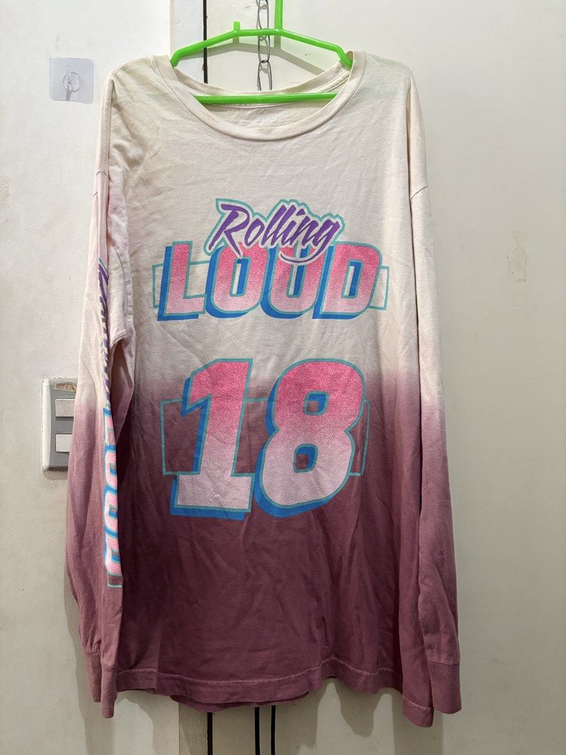 Rolling Loud 2018 Long Sleeve T-Shirt (Category: Tshirts & Polo Shirts ) located in Manila. Submitted by dominicoab75406 (Listing ID 1464374169, Image 1). Description: - Rolling Loud 2018 Oakland Coliseum Grounds Long Sleeve Tee - Features lineup for Sept 14, 15, & 16 - Includes performances by Wiz Khalifa and Travis Scott - Unique white to pink ombre dye effect - Ideal for music festival enthusiasts.