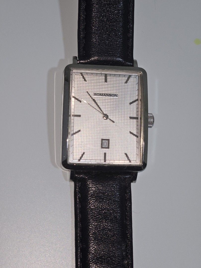 Romanson Quartz Dress Watch (Category: Luxury Watches) located in Antipolo. Submitted by hazyhaze21 (Listing ID 1464483622, Image 1). Description: Romanson DL5163NM quartz dress watch. The caseback clearly shows the model number DL5163NM, stainless-steel case, Swiss quartz, and WR 3 ATM (30 m)..