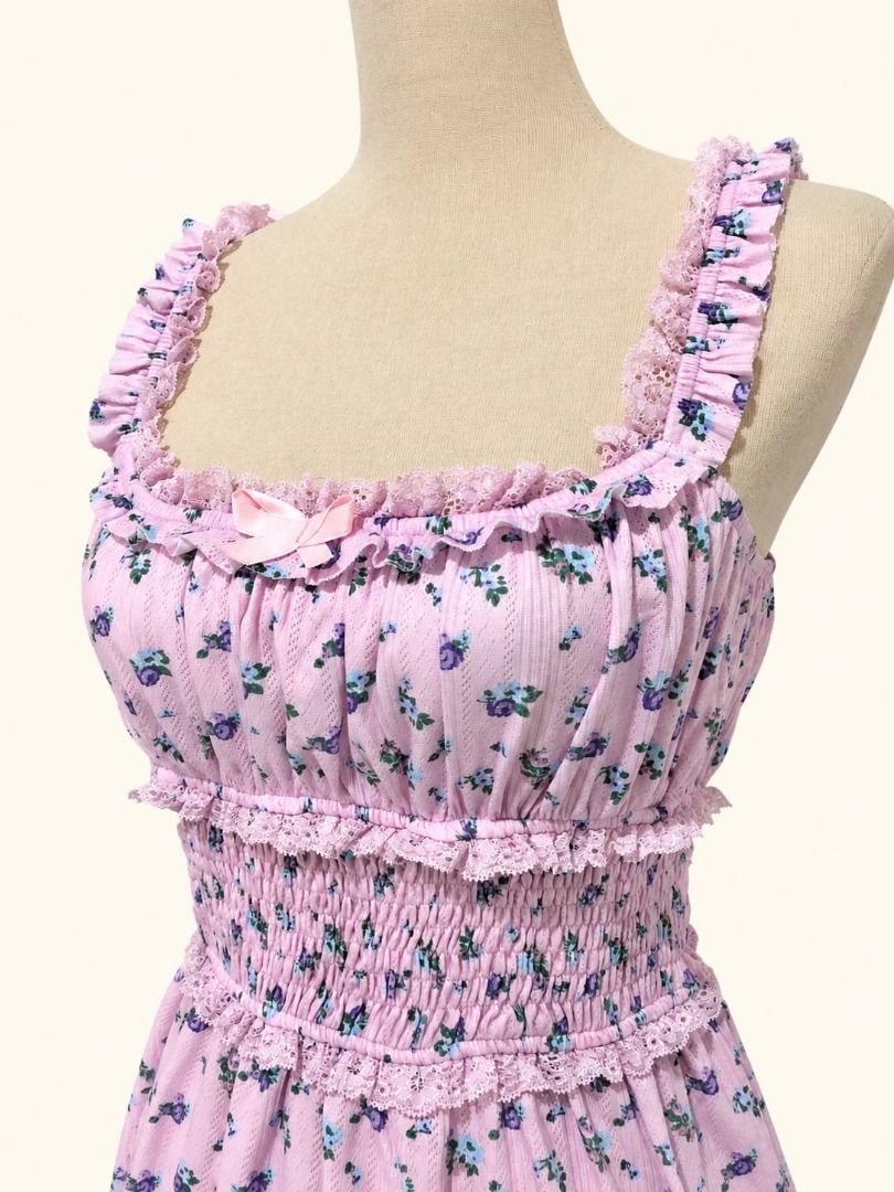 Rosie Bloom Mini Dress (Category: Dresses) located in Angeles City. Submitted by thebeehivecloset (Listing ID 1464488824, Image 3). Description: A cute and feminine floral mini dress featuring a smocked bodice, delicate ruffle details, lace accents, and a sweet bow for a soft vintage-inspired look.