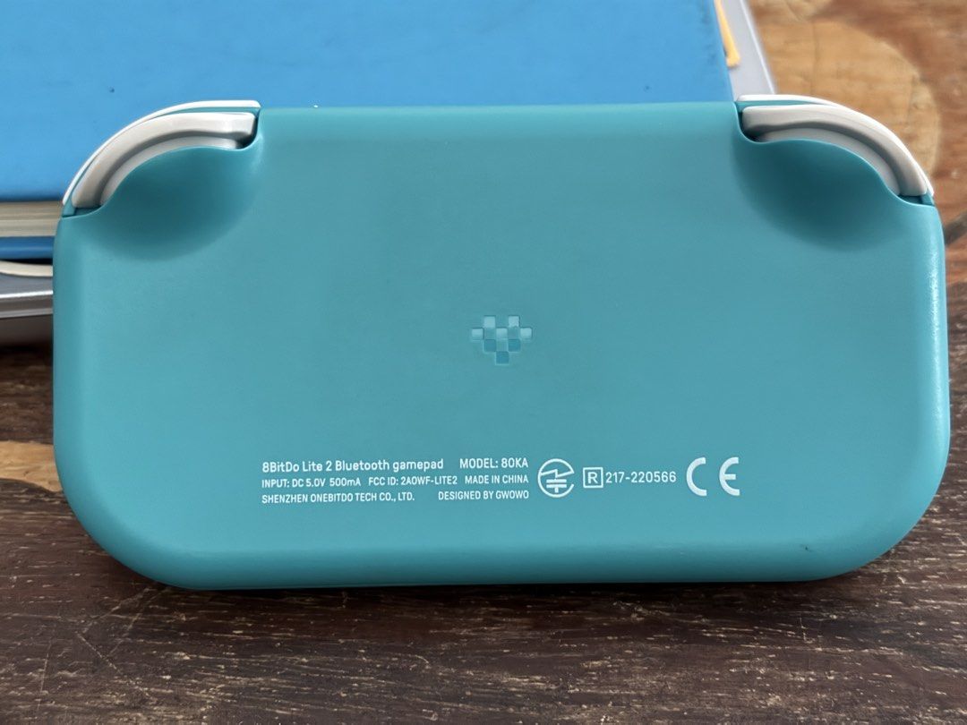 8BitDo Lite 2 Bluetooth Gamepad Torquiose (Category: Controllers) located in Santa Rosa. Submitted by jameskies (Listing ID 1464396071, Image 2). Description: - Teal 8BitDo Lite 2 Gamepad - Connects via Bluetooth - Features two joysticks and a D-pad - Standard A, B, X, Y buttons - Compact and lightweight design for gaming on the go - Compatible with multiple platforms RFS: - Decluterring - Barely used Last Price: ₱750.